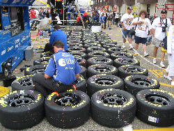 The first hours of race prep are spent getting tires, laying out tires, wire brushing the bolt holes, then glueing the lug nuts on.